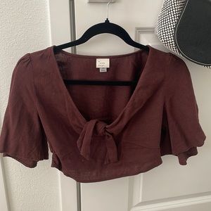 Cropped blouse with tie